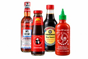 Bottles of soy sauce, chili oil, and seasoning pastes